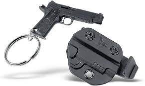 Unleash Your Inner Warrior with the Mini Gun Keychain: A Stylish and Powerful Accessory