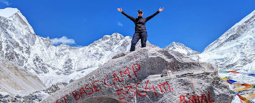 man on top of Everest