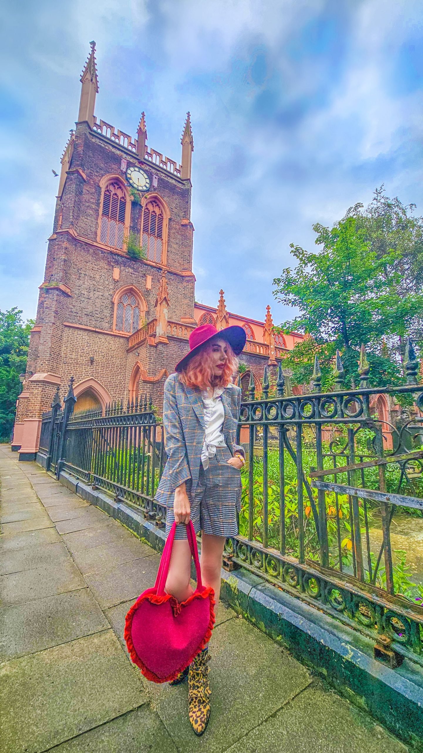 Stephi LaReine Liverpool Content Creator 2024 wearing Sumissura sustainable suit designed by AI outside St Michaels Church in Aigburth