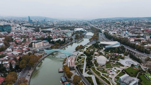 a canal town with a bridge and city scapes 